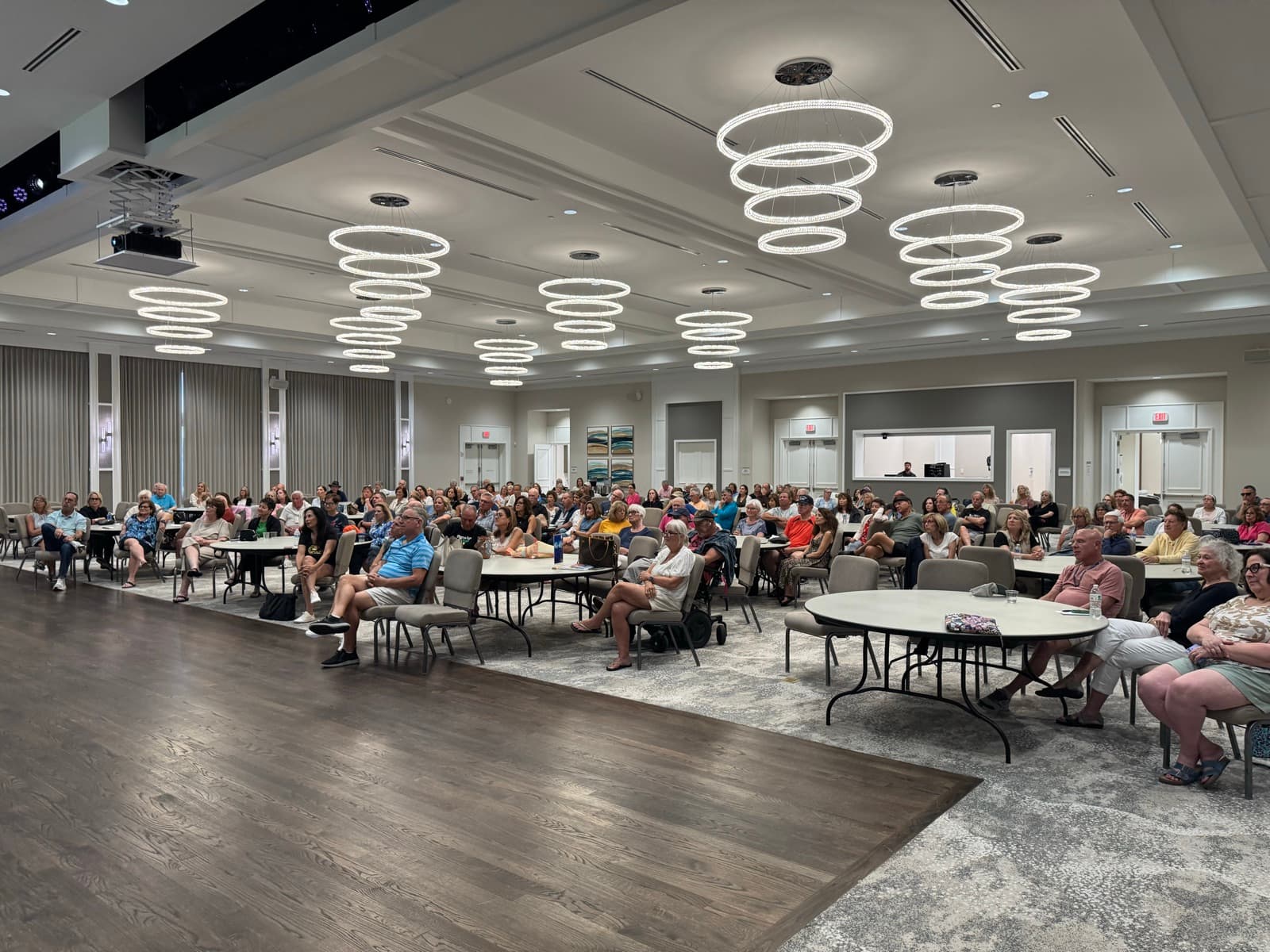 A packed ballroom of residents at the Valencia living community listening to Rebecca's talk.